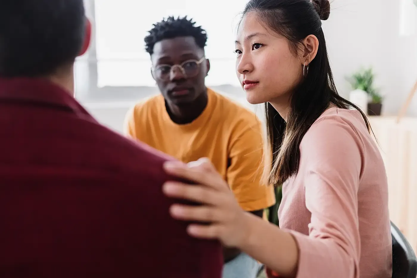 Photo of a meeting of young people in group therapy.