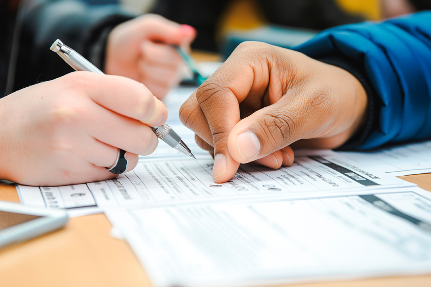 People filling out paperwork