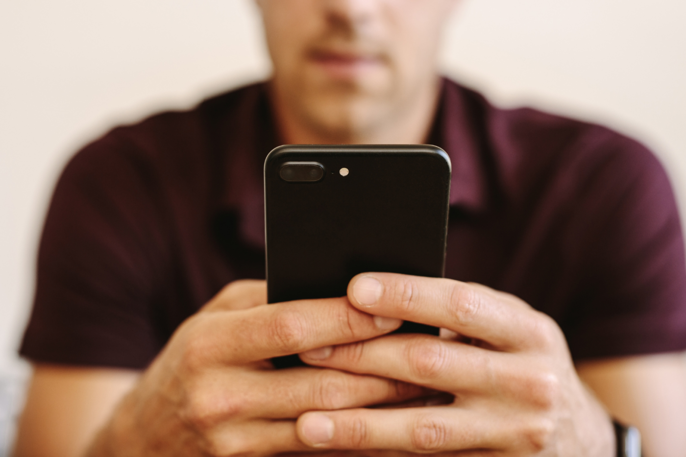 Man looking at cell phone